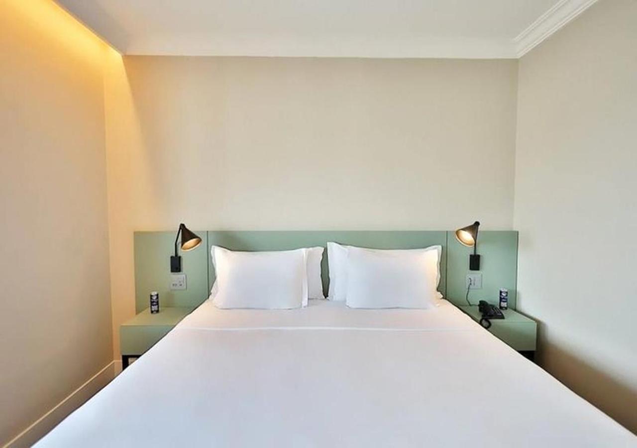 래디슨 오스카 프레이레 호텔 상파울루 외부 사진 A bedroom at the hotel
